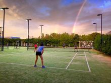 tenniscbr enjoys having a hit of tennis at Old Parliament House's Rose Garden tennis courts