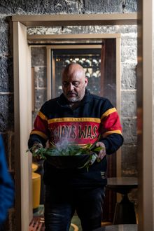 Wurundjeri Elder Uncle Bill Nicholson performs a ceremonial cleansing at Pentridge