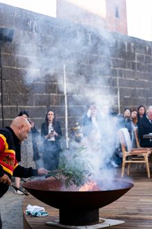 Wurundjeri Elder Uncle Bill Nicholson performs a ceremonial cleansing at Pentridge.