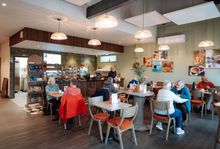 Customers in Perfect Waves Café