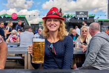 A lady enjoying a stein of beer at Folkestone Harbour's Wunder Harbour