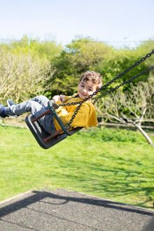 Child on swing at Kent Life Heritage Farm Park