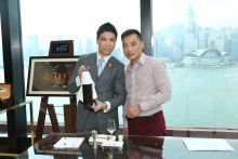 InterContinental Hong Kong Chief Sommelier Andy Au with Guinness World Records Buyer Mr. Jason Wong  - opening Croizet Cognac “Cuvée Leonie” 1858